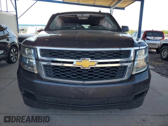 ✅ 2018 Chevrolet Suburban LS • VIN: 1GNSCGKC9JR384123 • Lot: 70710604. Wystawiony na Copart z przebiegiem 209 443 mil. Bezpłatny archiwum sprzedaży aukcyjnych z USA i szczegółowy raport historii pojazdu na DreamBid. Zdjęcie 5.
