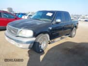 ✅ 2002 Ford F-150 XLT • VIN: 1FTRW07642KD38282 • Lot: 43599357. Listed on IAAI with 184,938 mi. Free auction sales archive from the USA and detailed vehicle history report at DreamBid. Image 2.