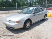 ✅ 2004 Oldsmobile Alero GL1 • VIN: 1G3NL52F84C132567 • Lot: 42811427. Wystawiony na IAAI z przebiegiem 159 781 mil. Bezpłatny archiwum sprzedaży aukcyjnych z USA i szczegółowy raport historii pojazdu na DreamBid. Zdjęcie 2.