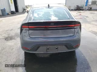 ✅ 2023 Toyota Prius LE • VIN: JTDACAAU1P3004571 • Lot: 57877853. Listed on Copart with 8,760 mi. Free auction sales archive from the USA and detailed vehicle history report at DreamBid. Image 6.