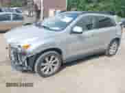 2013 Mitsubishi Outlander SE with VIN 4A4AR4AU3DE002006, listed as a IAAI auction lot 43009482 with 212,901 mi miles and . Bid and sale history available at DreamBid. Image 2.