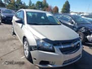 ✅ 2014 Chevrolet Cruze LS • VIN: 1G1PA5SH6E7165344 • Lot: 43513826. Listed on IAAI with 64,739 mi. Free auction sales archive from the USA and detailed vehicle history report at DreamBid. Image 1.