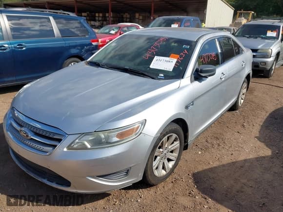 ✅ 2010 Ford Taurus SE • VIN: 1FAHP2DW0AG117634 • Lot: 43173085. Listed on IAAI with Not provided. Free auction sales archive from the USA and detailed vehicle history report at DreamBid. Image 2.