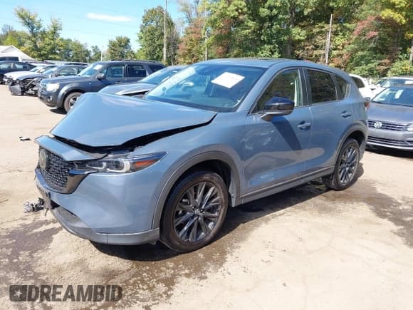 ✅ 2023 Mazda CX-5 S Carbon Edition • VIN: JM3KFBCM7P0227124 • Lot: 43393814. Wystawiony na IAAI z przebiegiem 16 516 mil. Bezpłatny archiwum sprzedaży aukcyjnych z USA i szczegółowy raport historii pojazdu na DreamBid. Zdjęcie 2.