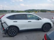 ✅ 2016 Honda CR-V SE • VIN: 5J6RM3H4XGL031716 • Лот: 43217157. Опубликован ранее на IAAI с пробегом 102 775 миль. Бесплатный доступ к архиву аукционных продаж из США и подробный отчёт об истории автомобиля на DreamBid. Изображение 13.