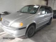 ✅ 2004 Kia Sedona LX • VIN: KNDUP131046505045 • Lot: 42460421. Listed on IAAI with 197,803 mi. Free auction sales archive from the USA and detailed vehicle history report at DreamBid. Image 2.