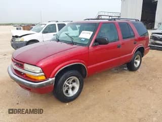 ✅ 2001 Chevrolet Blazer LT • VIN: 1GNCS13W112137572 • Lot: 42233556. Wystawiony na IAAI z przebiegiem 243 319 mil. Bezpłatny archiwum sprzedaży aukcyjnych z USA i szczegółowy raport historii pojazdu na DreamBid. Zdjęcie 2.