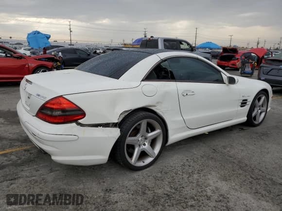 ✅ 2007 Mercedes-Benz SL 55/63 AMG • VIN: WDBSK72F47F133895 • Лот: 59736155. Опубликован ранее на Copart с пробегом 98 591 миль. Бесплатный доступ к архиву аукционных продаж из США и подробный отчёт об истории автомобиля на DreamBid. Изображение 3.