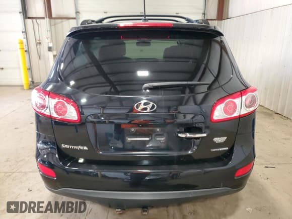 ✅ 2012 Hyundai Santa Fe Limited • VIN: 5XYZKDAG1CG109277 • Lot: 87080084. Listed on Copart with 86,219 mi. Free auction sales archive from the USA and detailed vehicle history report at DreamBid. Image 6.