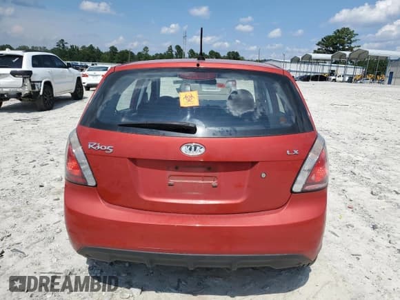 ✅ 2010 Kia Rio LX • VIN: KNADH5A35A6666444 • Lot: 65407605. Listed on Copart with 90,555 mi. Free auction sales archive from the USA and detailed vehicle history report at DreamBid. Image 6.