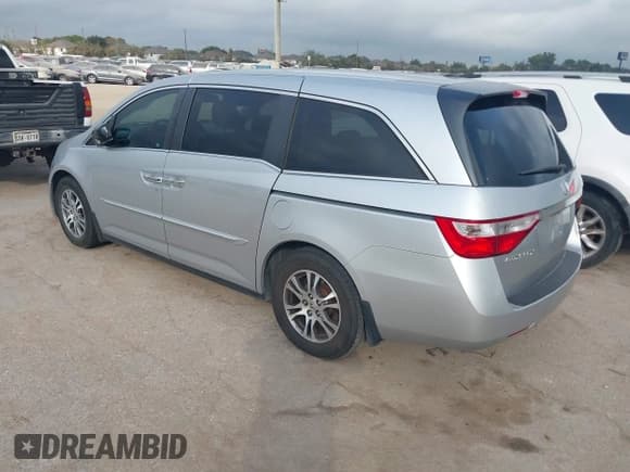 ✅ 2011 Honda Odyssey EX-L • VIN: 5FNRL5H62BB005368 • Lot: 43738477. Listed on IAAI with 207,719 mi. Free auction sales archive from the USA and detailed vehicle history report at DreamBid. Image 3.