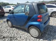✅ 2009 Smart fortwo Pure • VIN: WMEEJ31X69K312553 • Лот: 57811135. Опубликован ранее на Copart с пробегом 156 487 миль. Бесплатный доступ к архиву аукционных продаж из США и подробный отчёт об истории автомобиля на DreamBid. Изображение 2.