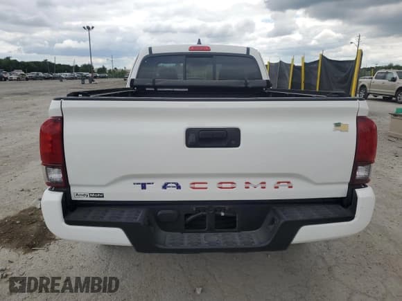 ✅ 2022 Toyota Tacoma SR • VIN: 3TYRX5GN1NT040078 • Lot: 69957595. Listed on Copart with 24,018 mi. Free auction sales archive from the USA and detailed vehicle history report at DreamBid. Image 6.
