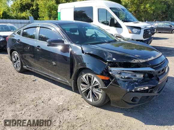 ✅ 2018 Honda Civic EX-T • VIN: 2HGFC1F45JH102801 • Лот: 82077135. Опубликован ранее на Copart с пробегом 133 216 миль. Бесплатный доступ к архиву аукционных продаж из США и подробный отчёт об истории автомобиля на DreamBid. Изображение 4.