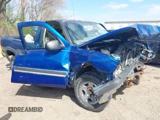2003 Chevrolet Silverado 1500 LS z VIN 1GCEC14XX3Z279418, wystawiony jako IAAI lot #42022868 z przebiegiem Nie podano mil oraz . Historia ofert i sprzedaży dostępna na DreamBid. Obrazek 1.