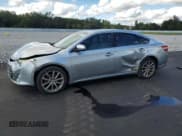 ✅ 2015 Toyota Avalon XLE • VIN: 4T1BK1EB6FU137931 • Lot: 90418775. Listed on Copart with 149,072 mi. Free auction sales archive from the USA and detailed vehicle history report at DreamBid. Image 1.