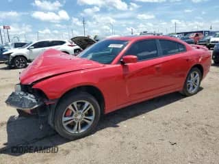 2012 Dodge Charger SXT Plus z VIN 2C3CDXJG8CH241119, wystawiony jako Copart lot #62420585 z przebiegiem Nie podano mil oraz Szkoda całkowita • Salvage title. Historia ofert i sprzedaży dostępna na DreamBid. Obrazek 1.