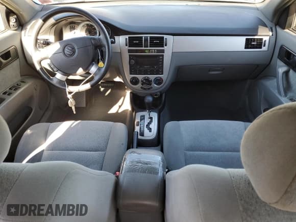 ✅ 2004 Suzuki Forenza S • VIN: KL5JD52Z54K991570 • Lot: 49380694. Wystawiony na Copart z przebiegiem 98 943 mil. Bezpłatny archiwum sprzedaży aukcyjnych z USA i szczegółowy raport historii pojazdu na DreamBid. Zdjęcie 8.