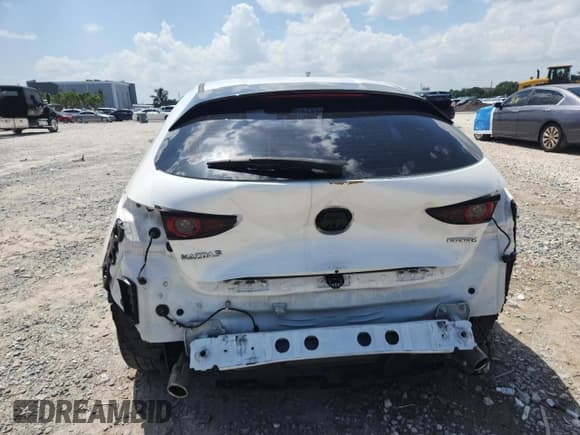 ✅ 2021 Mazda 3 S • VIN: JM1BPAJL0M1306554 • Lot: 70041405. Wystawiony na Copart z przebiegiem 9 999 mil. Bezpłatny archiwum sprzedaży aukcyjnych z USA i szczegółowy raport historii pojazdu na DreamBid. Zdjęcie 6.