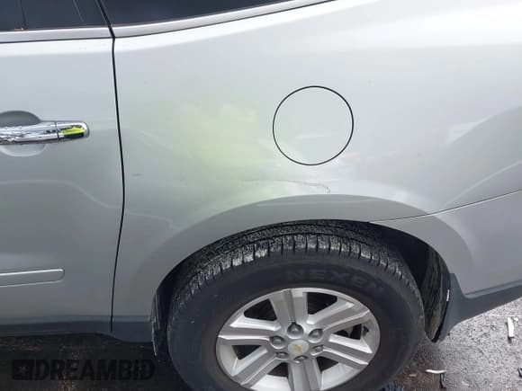 ✅ 2014 Chevrolet Traverse LT • VIN: 1GNKRHKD2EJ121683 • Lot: 43782251. Listed on IAAI with 167,147 mi. Free auction sales archive from the USA and detailed vehicle history report at DreamBid. Image 6.