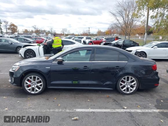 ✅ 2014 Volkswagen Jetta GLI • VIN: 3VW5T7AJ6EM258246 • Lot: 43543504. Listed on IAAI with 124,950 mi. Free auction sales archive from the USA and detailed vehicle history report at DreamBid. Image 14.