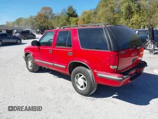 ✅ 1999 Chevrolet Blazer LS • VIN: 1GNDT13WXX2103995 • Lot: 43444997. Wystawiony na IAAI z przebiegiem 211 763 mil. Bezpłatny archiwum sprzedaży aukcyjnych z USA i szczegółowy raport historii pojazdu na DreamBid. Zdjęcie 3.
