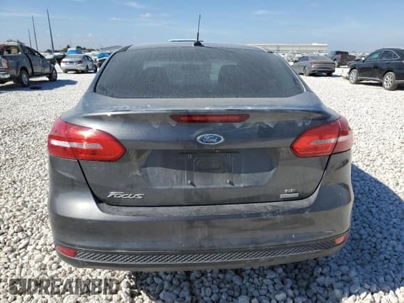 ✅ 2018 Ford Focus SE • VIN: 1FADP3FE7JL229461 • Lot: 82499245. Wystawiony na Copart z przebiegiem 66 300 mil. Bezpłatny archiwum sprzedaży aukcyjnych z USA i szczegółowy raport historii pojazdu na DreamBid. Zdjęcie 6.
