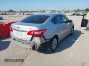 ✅ 2018 Nissan Sentra S • VIN: 3N1AB7AP7JY322938 • Lot: 43223250. Listed on IAAI with 208,520 mi. Free auction sales archive from the USA and detailed vehicle history report at DreamBid. Image 4.