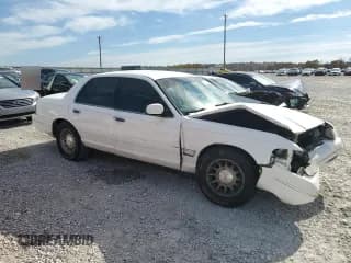 ✅ 1999 Ford Crown Victoria LX • VIN: 2FAFP74W5XX114493 • Lot: 91088365. Listed on Copart with 207,945 mi. Free auction sales archive from the USA and detailed vehicle history report at DreamBid. Image 4.
