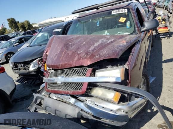 2003 Chevrolet Silverado 1500 LS with VIN 2GCEC19T931387303, listed as a Copart auction lot 65946904 with Not provided miles and Salvage title. Bid and sale history available at DreamBid. Image 5.