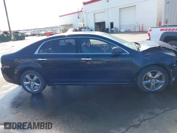 2012 Chevrolet Malibu 2LT z VIN 1G1ZD5EU4CF123265, wystawiony jako IAAI lot #43399908 z przebiegiem 146 993 mil mil oraz . Historia ofert i sprzedaży dostępna na DreamBid. Obrazek 13.