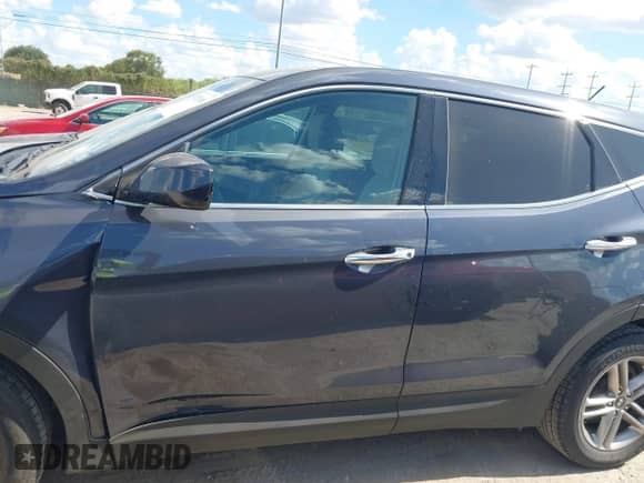 2018 Hyundai Santa Fe 2.4L z VIN 5NMZT3LB3JH073815, wystawiony jako IAAI lot #43292068 z przebiegiem 132 770 mil mil oraz . Historia ofert i sprzedaży dostępna na DreamBid. Obrazek 14.