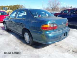 2002 Chevrolet Malibu z VIN 1G1ND52J72M569039, wystawiony jako IAAI lot #41668349 z przebiegiem 105 161 mil mil oraz . Historia ofert i sprzedaży dostępna na DreamBid. Obrazek 3.