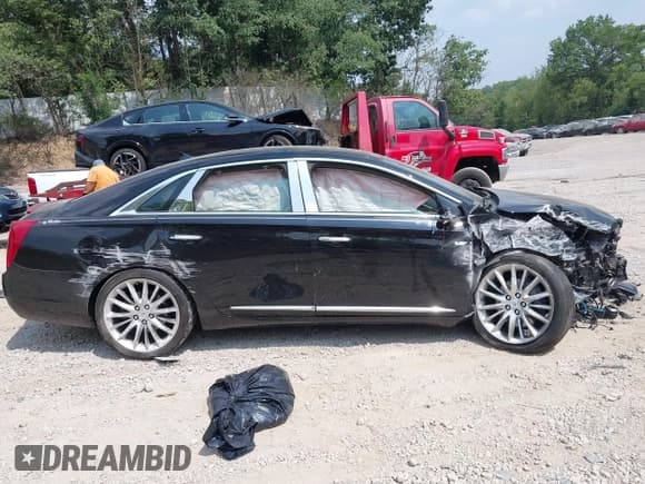 ✅ 2014 Cadillac XTS Platinum • VIN: 2G61W5S85E9159745 • Лот: 42922377. Опубликован ранее на IAAI с пробегом 75 145 миль. Бесплатный доступ к архиву аукционных продаж из США и подробный отчёт об истории автомобиля на DreamBid. Изображение 12.