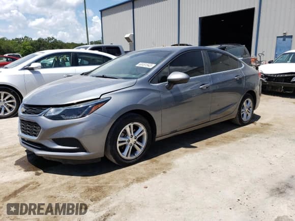 ✅ 2018 Chevrolet Cruze LT • VIN: 1G1BE5SM1J7241431 • Lot: 63491543. Listed on Copart with 64,775 mi. Free auction sales archive from the USA and detailed vehicle history report at DreamBid. Image 1.