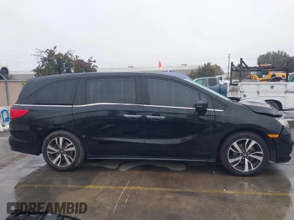 ✅ 2018 Honda Odyssey Elite • VIN: 5FNRL6H97JB092747 • Лот: 43745331. Опубликован ранее на IAAI с пробегом 89 865 миль. Бесплатный доступ к архиву аукционных продаж из США и подробный отчёт об истории автомобиля на DreamBid. Изображение 14.