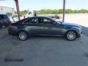 ✅ 2014 Cadillac CTS Luxury AWD • VIN: 1G6AX5SX7E0159728 • Lot: 43073163. Listed on IAAI with 153,349 mi. Free auction sales archive from the USA and detailed vehicle history report at DreamBid. Image 13.