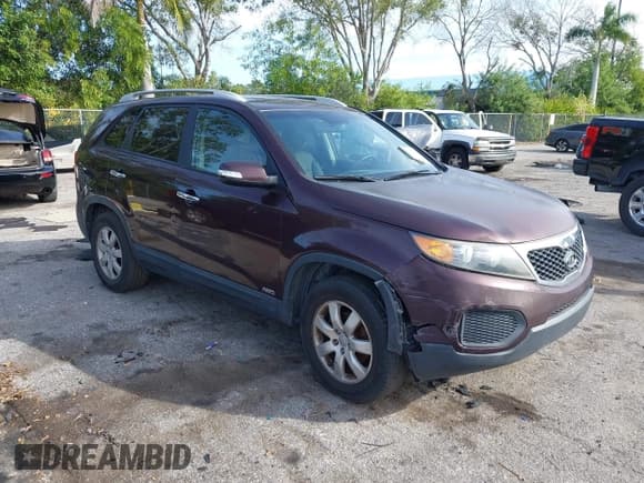 ✅ 2013 Kia Sorento LX • VIN: 5XYKTDA20DG397748 • Lot: 43802514. Listed on IAAI with 144,489 mi. Free auction sales archive from the USA and detailed vehicle history report at DreamBid. Image 1.