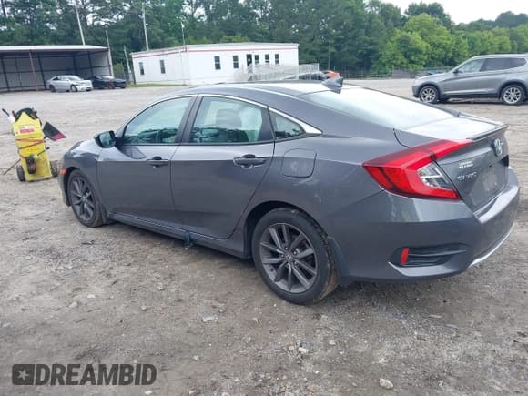 ✅ 2020 Honda Civic EX-L • VIN: 19XFC1F71LE010141 • Lot: 42502174. Listed on IAAI with 60,000 mi. Free auction sales archive from the USA and detailed vehicle history report at DreamBid. Image 3.