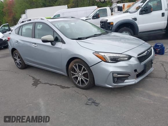 ✅ 2018 Subaru Impreza Limited • VIN: 4S3GTAT65J3731857 • Lot: 42199163. Listed on IAAI with 62,621 mi. Free auction sales archive from the USA and detailed vehicle history report at DreamBid. Image 1.