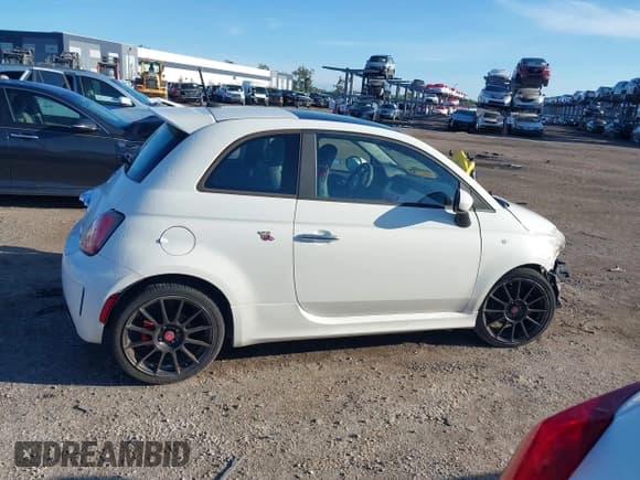 ✅ 2015 FIAT 500 Abarth • VIN: 3C3CFFFH4FT501047 • Lot: 42524666. Listed on IAAI with 50,875 mi. Free auction sales archive from the USA and detailed vehicle history report at DreamBid. Image 14.