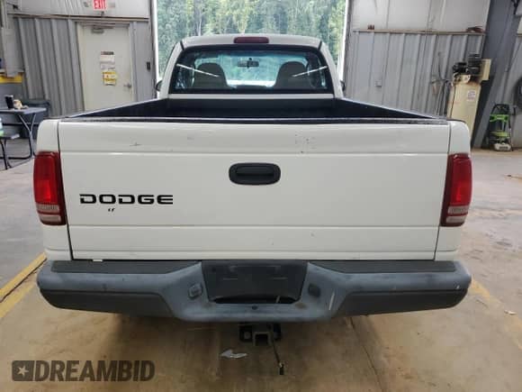 2003 Dodge Dakota z VIN 1D7FL16X73S307529, wystawiony jako Copart lot #73568784 z przebiegiem 314 924 mil mil oraz Szkoda całkowita • Salvage title. Historia ofert i sprzedaży dostępna na DreamBid. Obrazek 6.