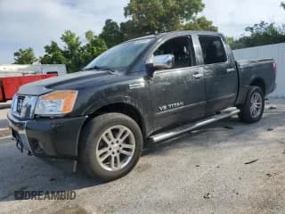 ✅ 2015 Nissan Titan Pro-4X • VIN: 1N6BA0EC7FN511979 • Lot: 66539665. Listed on Copart with 125,699 mi. Free auction sales archive from the USA and detailed vehicle history report at DreamBid. Image 1.