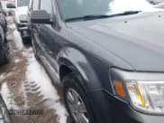 ✅ 2011 Mercury Mariner • VIN: 4M2CN9BG5BKJ03462 • Lot: 41770084. Listed on IAAI with 120,508 mi. Free auction sales archive from the USA and detailed vehicle history report at DreamBid. Image 12.