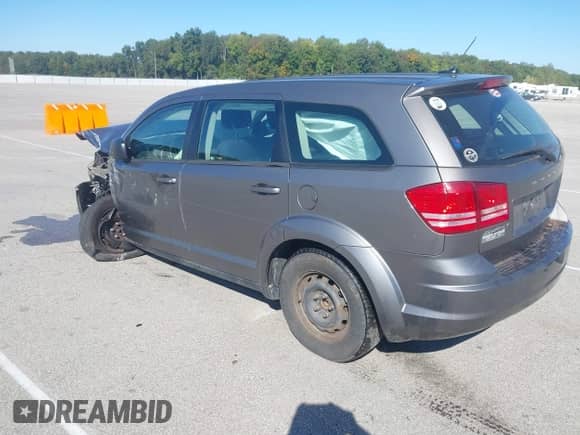 2012 Dodge Journey American Value with VIN 3C4PDCAB2CT255132, listed as a IAAI auction lot 43393533 with 178,133 mi miles and . Bid and sale history available at DreamBid. Image 3.