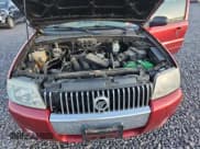 ✅ 2006 Mercury Mariner Luxury • VIN: 4M2CU56156DJ07815 • Лот: 89642415. Опубликован ранее на Copart с пробегом 113 923 миль. Бесплатный доступ к архиву аукционных продаж из США и подробный отчёт об истории автомобиля на DreamBid. Изображение 11.