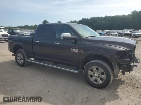 ✅ 2017 Ram 2500 Laramie • VIN: 3C6UR5FL9HG685345 • Lot: 65471705. Listed on Copart with 48,936 mi. Free auction sales archive from the USA and detailed vehicle history report at DreamBid. Image 4.