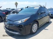 ✅ 2021 Toyota Prius L Eco • VIN: JTDKAMFU2M3150994 • Lot: 42760734. Listed on IAAI with 85,235 mi. Free auction sales archive from the USA and detailed vehicle history report at DreamBid. Image 2.