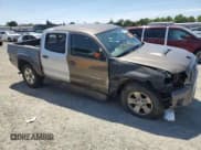 ✅ 2015 Toyota Tacoma • VIN: 3TMLU4EN7FM188941 • Lot: 56965585. Listed on Copart with 124,192 mi. Free auction sales archive from the USA and detailed vehicle history report at DreamBid. Image 4.