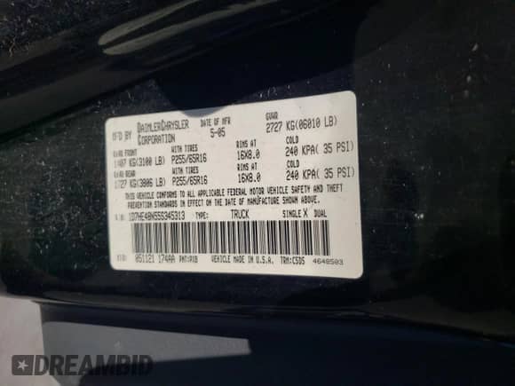 2005 Dodge Dakota SLT z VIN 1D7HE48N55S345313, wystawiony jako Copart lot #81206784 z przebiegiem Nie podano mil oraz Szkoda całkowita • Salvage title. Historia ofert i sprzedaży dostępna na DreamBid. Obrazek 14.
